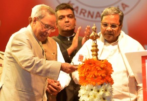 The President, Shri Pranab Mukherjee lighting the lamp at the launch of the Mobile One, a Mobile Governance application of Govt. of Karnataka, in Bangalore on December 8, 2014.