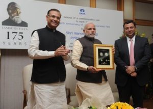 The Prime Minister of India, Mr. Narendra Modi, releases a commemorative coin to mark the 175th birth anniversary of Jamsetji Nusserwanji Tata, pioneer of India’s industrialisation and the Founder of the Tata group, in the presence of the Minister of State (Finance), Mr. Jayant Sinha, and the Chairman of Tata Sons, Mr. Cyrus P. Mistry, at a special ceremony in New Delhi, on January 6, 2015. Photo source:- Tata.com